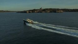 An MJM 40z power boat blasts through Narragansett Bay near Horsehead in Jamestown, Rhode Island. Stock Footage