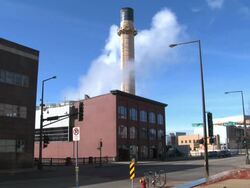 A smokestack on top of a building on Market Street in St. Paul Stock Footage