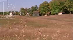 Static shot of country houses in the countryside Stock Footage