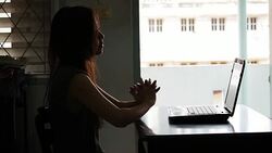 Tired woman with a laptop Stock Footage