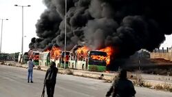 Aleppo evacuation buses set on fire near Idlib News Clip