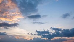 Beautiful yellow cloudscape with sunlight beams Stock Footage