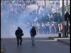 Explosion Rocks Industrial Suburb Of Beirut, Anti-Syrian Lawmaker Killed In Car Bomb, Police Fire Tear Gas At Protesters Outside Danish Mission, Hezbollah Claims Israeli Soldiers Captured, Beirut Reax, Cross-Border Shelling, Troops And Tanks, Olmert, Israeli Strike On Beirut Airport Runways News Clip