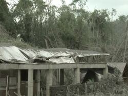 Building damaged by heavy Ashfall from eruption of Merapi volcano; Indonesia. 7 November 2010 / AUDIO Stock Footage