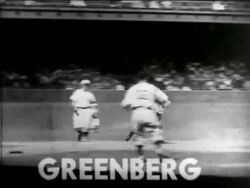 B/W 1938 PAN pro baseball player running around bases + sliding into home plate Stock Footage
