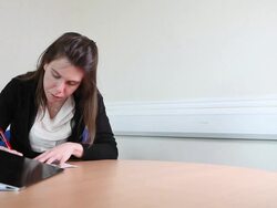 Female legal worker signing documents Stock Footage