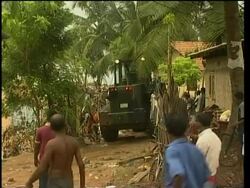 US Marines set up base camp, clear debris from village News Clip