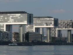 WS View of modern office buildings with Rheinauhafen and Rhine River at dusk /Cologne, North Rhine-Westphalia, Germany  Stock Footage