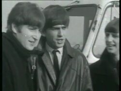 1963 MONTAGE MS PAN George Harrison, John Lennon, Paul McCartney, and Ringo Starr at airport / MS PAN The Beatles waving before climbing steps into BEA plane bound for Sweden in October 1963 / London, England Stock Footage