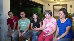 CLEAN : Relatives of MH370 victims react to debris confirmation News Clip