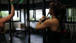 Determined athletes pulling resistance bands Stock Footage