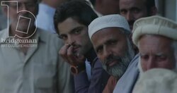 Men gather on the street, Bahrain, Swat Stock Footage