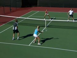 SLO MO, WS, HA, Two young couples playing doubles tennis, Santa Barbara, California, USA Stock Footage