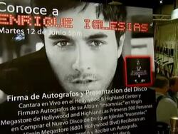 Enrique Iglesias Promotes Release of 'Insomniac' with Performance and Signing Stock Footage