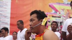 CLEAN : Swords and skewers at Thailand's gruesome vegetarian festival News Clip