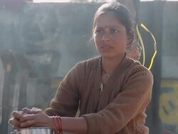 MS Young woman In Sesame mill / Pala, Rajasthan, India Stock Footage