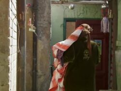 MS Shot of family life in small apartment, women entering in her room / Cairo, Egypt Stock Footage