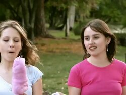Girls eating cotton candy Stock Footage
