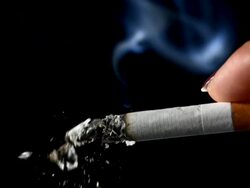 HD Super Slow-Mo: Woman Tapping A Cigarette Stock Footage