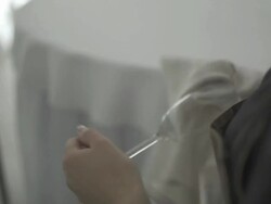 women cleaning a glass Stock Footage