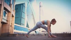 Young Woman Doing Yoga Meditation Exercises at Sunset Stock Footage
