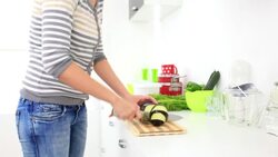 cutting vegetables Stock Footage