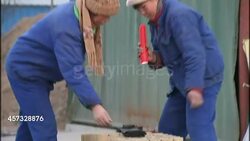 Fireworks factory workers making display fireworks News Clip