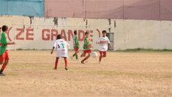 Brazilian boys fight for ball in youth soccer game Stock Footage