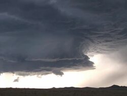 Pretty Supercell storm zooms out from swirl of clouds, severe thunderstorm, WA, USA Stock Footage