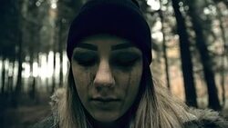 Psychotic young woman looking at the camera Stock Footage