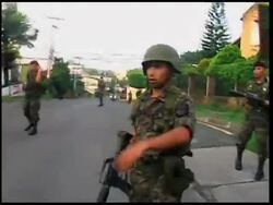 WRAP Saturday pix of Zelaya ADDS soldiers surround presidential home News Clip