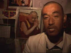 Monks lead candlelit march over Tibet; Argentina demo News Clip