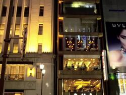 Lit Buildings at Ginza at Night with Ginza Line Subway Entrance, Tokyo, Japan Stock Footage