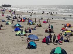 WS View of crowd of people at beach, North Sea North Frisia, / St. Peter Ording, Schleswig Holstein, Germany Stock Footage