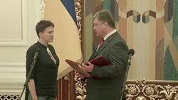 CLEAN : Ukraines Savchenko gets heros welcome after prisoner swap News Clip