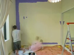 MS T/L TU TD ZI Father and daughter moving furniture and painting wall with purple color at bedroom / Melbourne, Victoria, Australia Stock Footage
