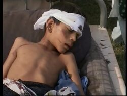 Aerials, wounded being airlifted, morgue, army comment News Clip