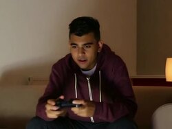 Teenager gaming, losing and winning. Stock Footage