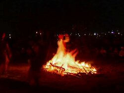 MS Folk dancers performing  dance around fire in camel fair   / Pushkar, Rajasthan, India Stock Footage