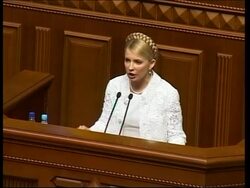 Tymoshenko leads faction out of Ukraine's parliament, demanding its dissolution. News Clip