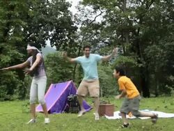 Family playing in a forest, Malshej Ghat, Maharashtra, India Stock Footage
