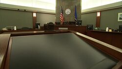 An American flag and the City of Las Vegas flag decorate a courtroom. Stock Footage