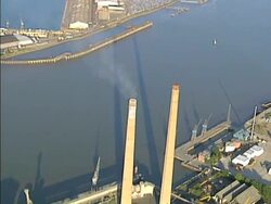 Aerial view of heavy industry smoke tower. NTSC, PAL Stock Footage