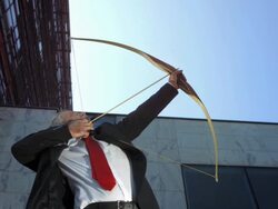 HD DOLLY: Executive Aiming Up In The Air Stock Footage