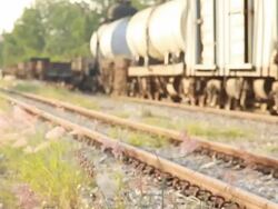 Railway engine pulling wagons loaded with coal. Stock Footage
