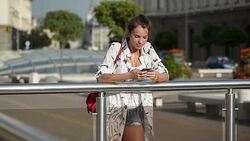 Young woman listening to music Stock Footage