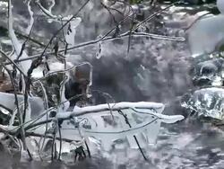 MS Icicle on tree branch and below branches flowing water / Kastel, Rhineland-Palatinate, Germany  Stock Footage