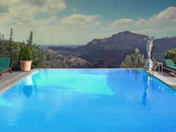 MS, HA, Swimming pool and hills in background, Formentor, Majorca, Spain Stock Footage