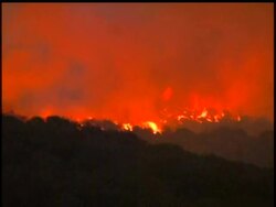 The California wildfire that's ravaging the mountains north of Los Angeles drew within a half-mile of the revered Mount Wilson Observatory Monday, threatening the birthplace of modern astronomy. News Clip