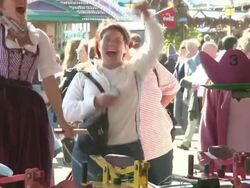 woman play the game with frogs and winning Stock Footage